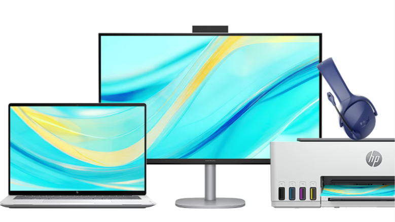 Hp laptop, montior, headset and printer against a white background. The screensavers are teal with royal blue and sunshine yellow ribbons through it. 