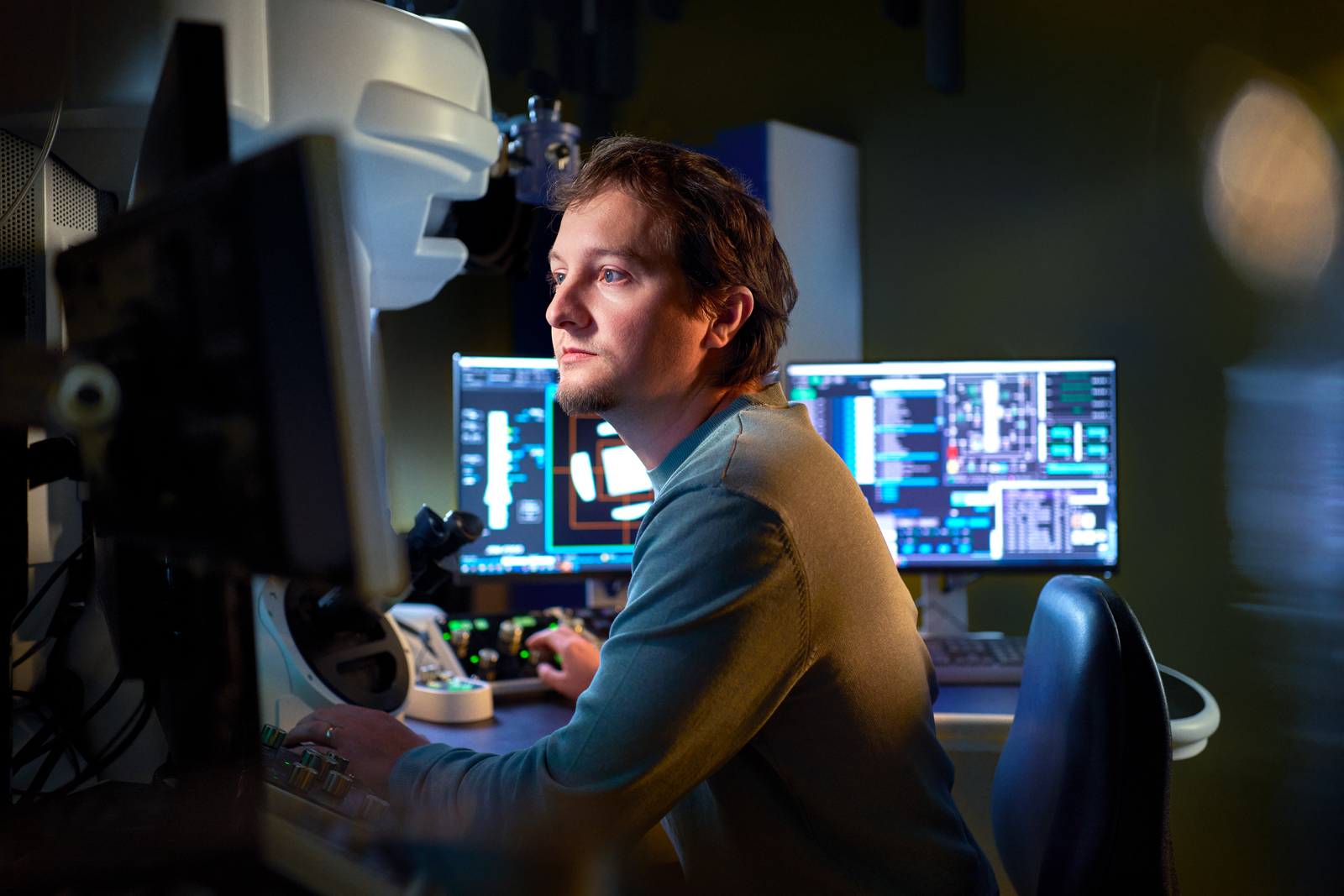 a man at desk looking at webconsole