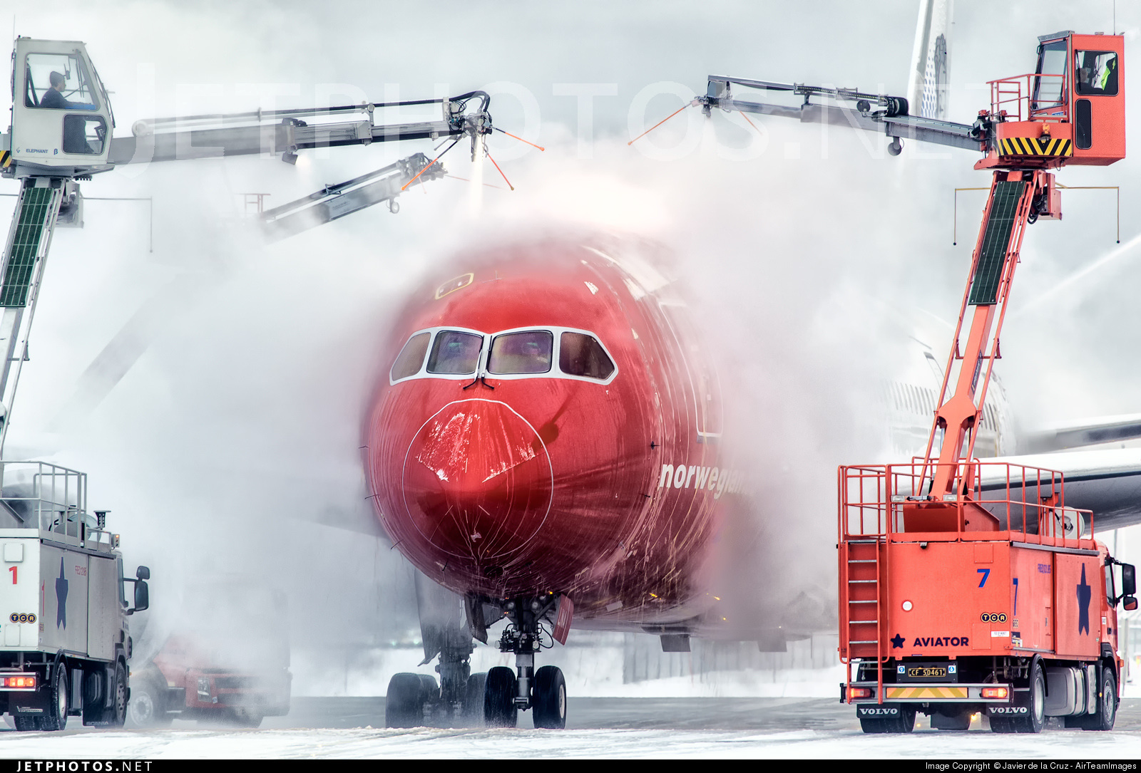 A Norwegian 787 being deiced