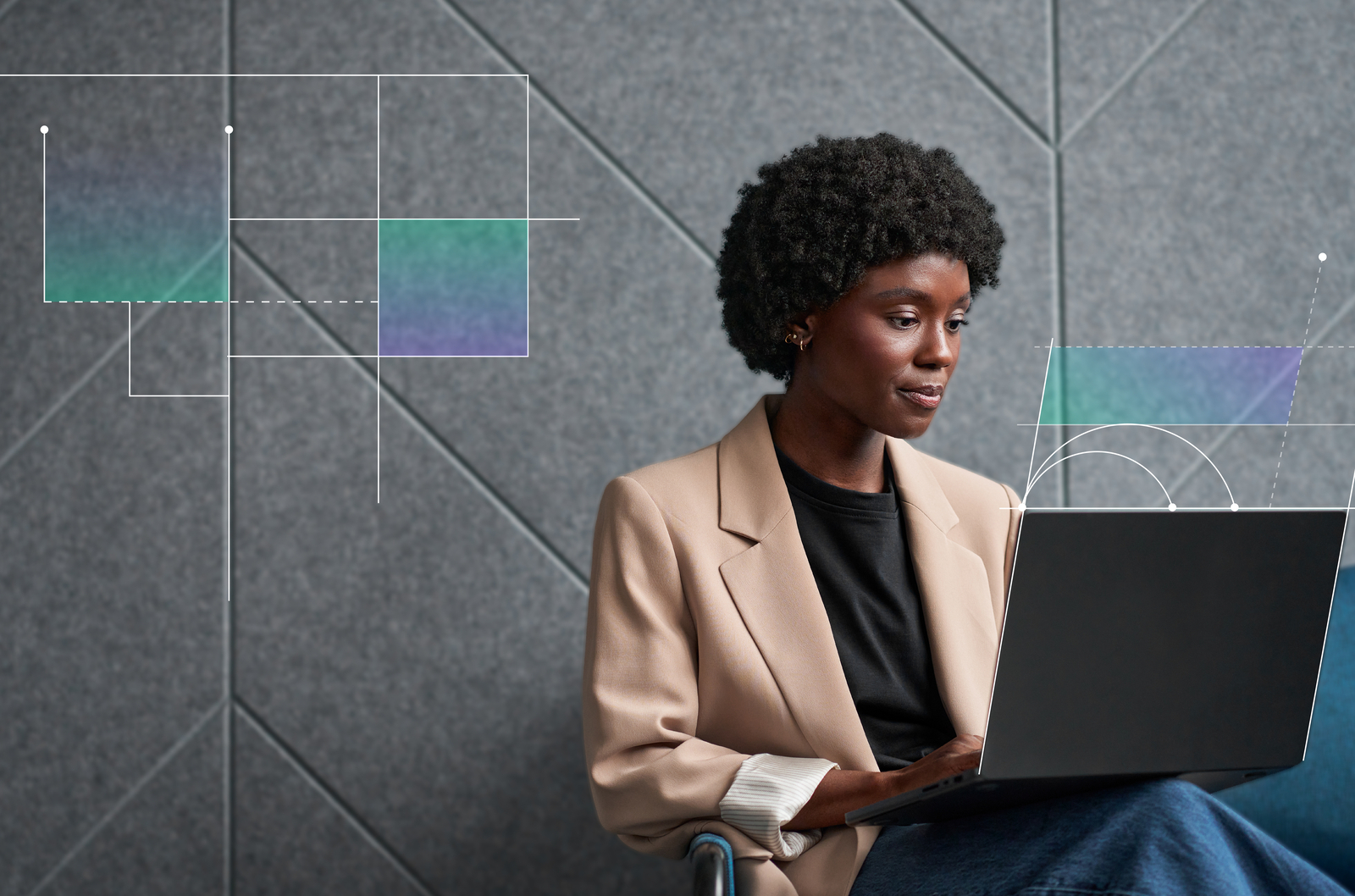 a woman holding a laptop