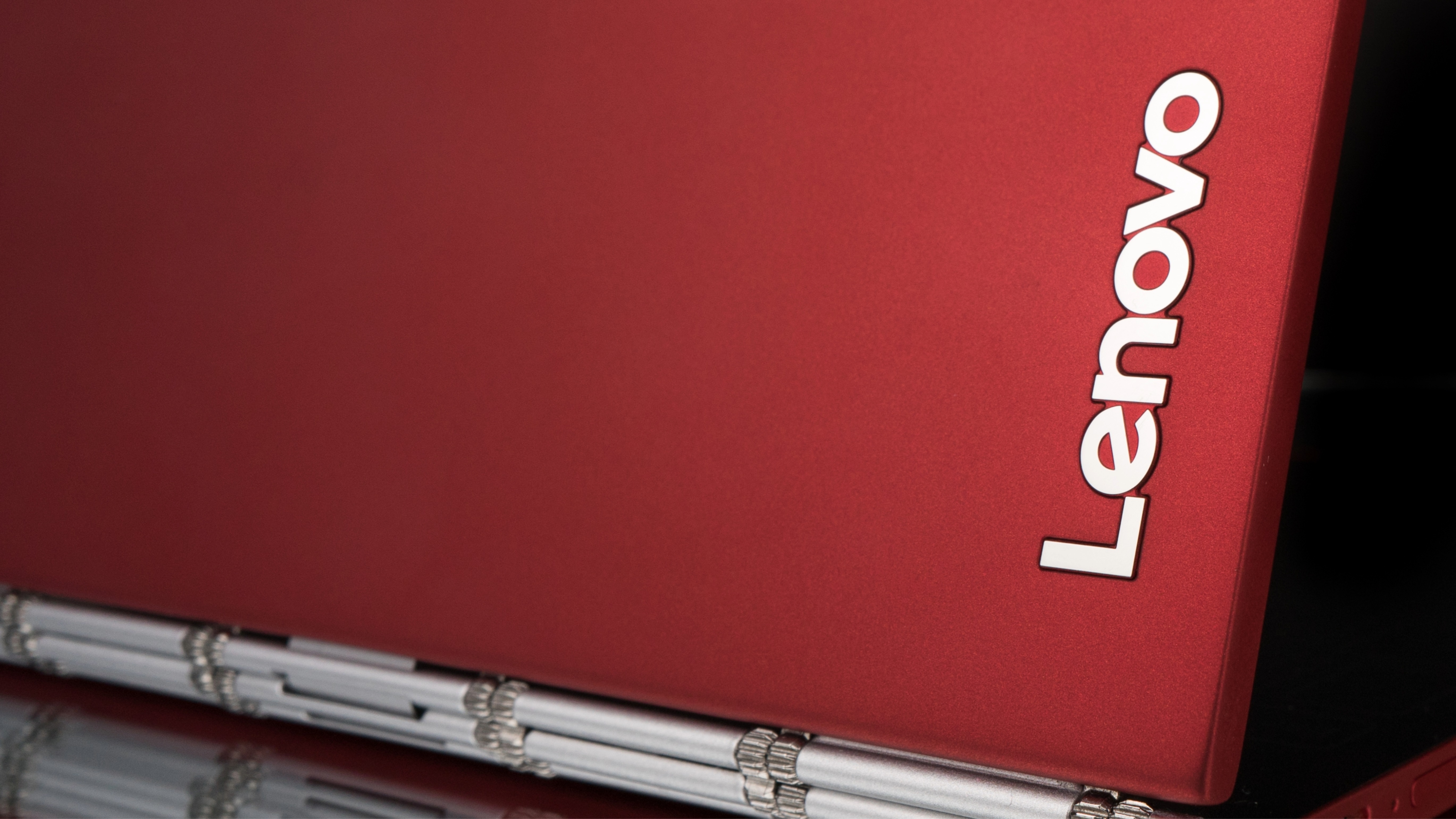 Red Lenovo laptop